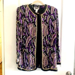 Vintage long sleeved jacket. Size large, brand unknown